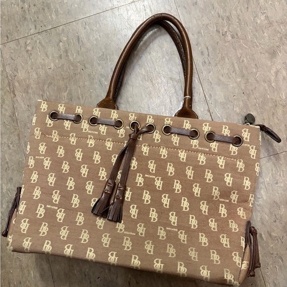 Dooney & Bourke Handbags - Dooney & Bourke Brown and Cream Monogram Tote with Tassel Detail